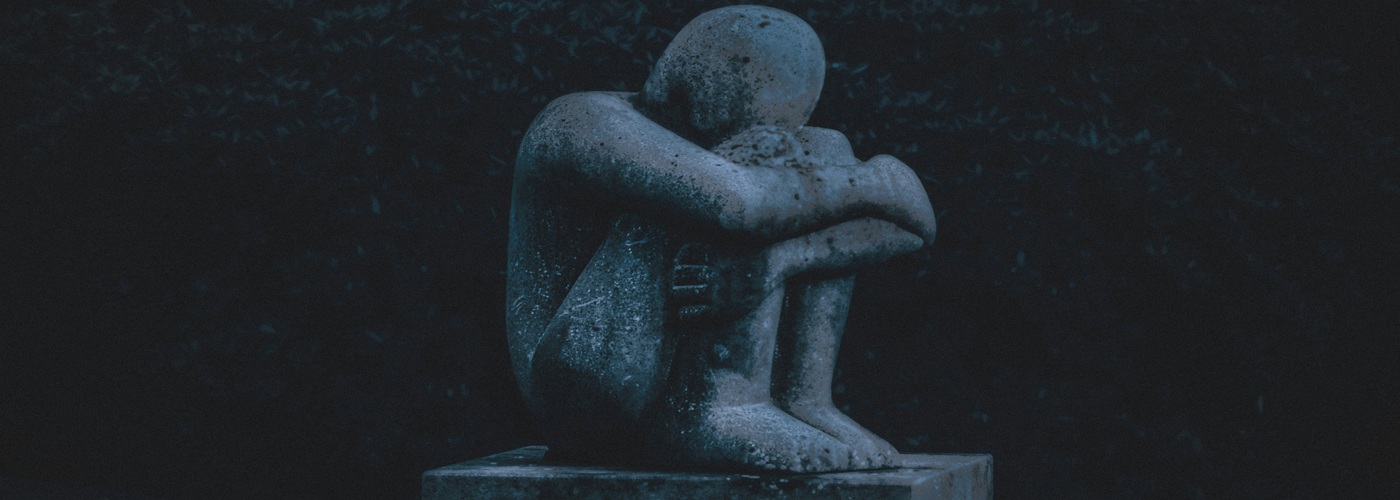 statue sad depression
