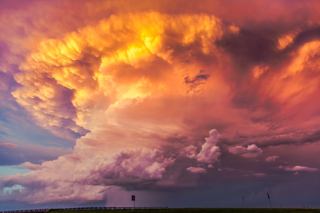 Storm clouds build during sunset